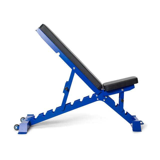 The Buzz-Saw Heavy-Duty Adjustable Bench by Bells of Steel, shown in a side profile against a white background, features an adjustable blue back pad on a heavy-duty frame with a black padded seat. It's set at an incline position and includes wheels for easy mobility.