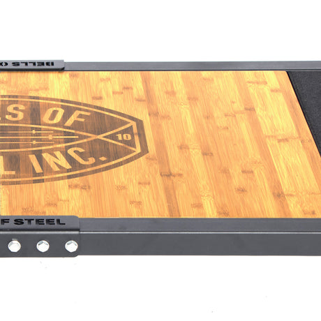A close-up of the Bells of Steel Deadlift Platform Bamboo Insert (Right) shows its wood grain, partial "OF INC." logo, and a gray metal border with bolts, highlighting its modular platform design.