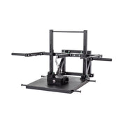 The Bells of Steel Belt Squat Machine is an adjustable black metal dip station for home gyms, featuring handle grips and a hanging chain with weight attachment. It's perfect for strength training exercises to boost lower body strength, functioning like a belt squat machine.