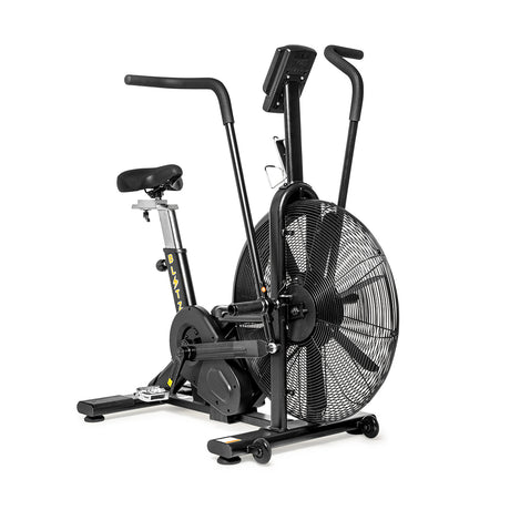 The Bells of Steel Blitz Air Bike is a black exercise machine with a large front fan, two vertical handlebars, cushioned seat, and pedals—perfect for full-body cardio workouts in your home gym.