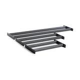 The Bells of Steel Bumper Plate Pins Shelf is a sleek, minimalist black four-tier wall-mounted shoe rack. It features two parallel metal bars per tier and exudes modern design against a plain white background, perfectly aiding in organization.