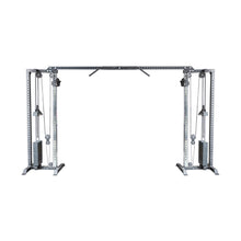 The Bells of Steel Cable Crossover Machine features dual adjustable pulleys, weight stacks on both sides, and a pull-up bar—ideal for versatile strength training exercises.