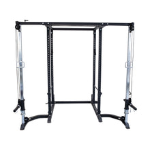 The Bells of Steel Cable Crossover (2.3" x 2.3" Racks) is a black metal power rack with dual adjustable cable pulley systems on each side, offering versatile weightlifting and strength training, shown against a white background.