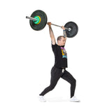 male model doing Olympic lift with urethane change plates
