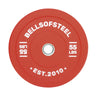 The Bells of Steel Colored Bumper Plate is red, marked "55 LBS" and "BELLSOFSTEEL" in white text, with a stainless steel center ring. The phrase "EST. 2010" elegantly enhances its classic appeal.