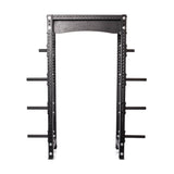 The Bells of Steel Hydra Collegiate Power Rack Builder (3" x 3", ⅝" holes) is a sturdy, large black rack with Hydra attachments, multiple modular component holes, four vertical bars, and horizontal pegs for storing weight plates, ideal for weightlifting exercises.