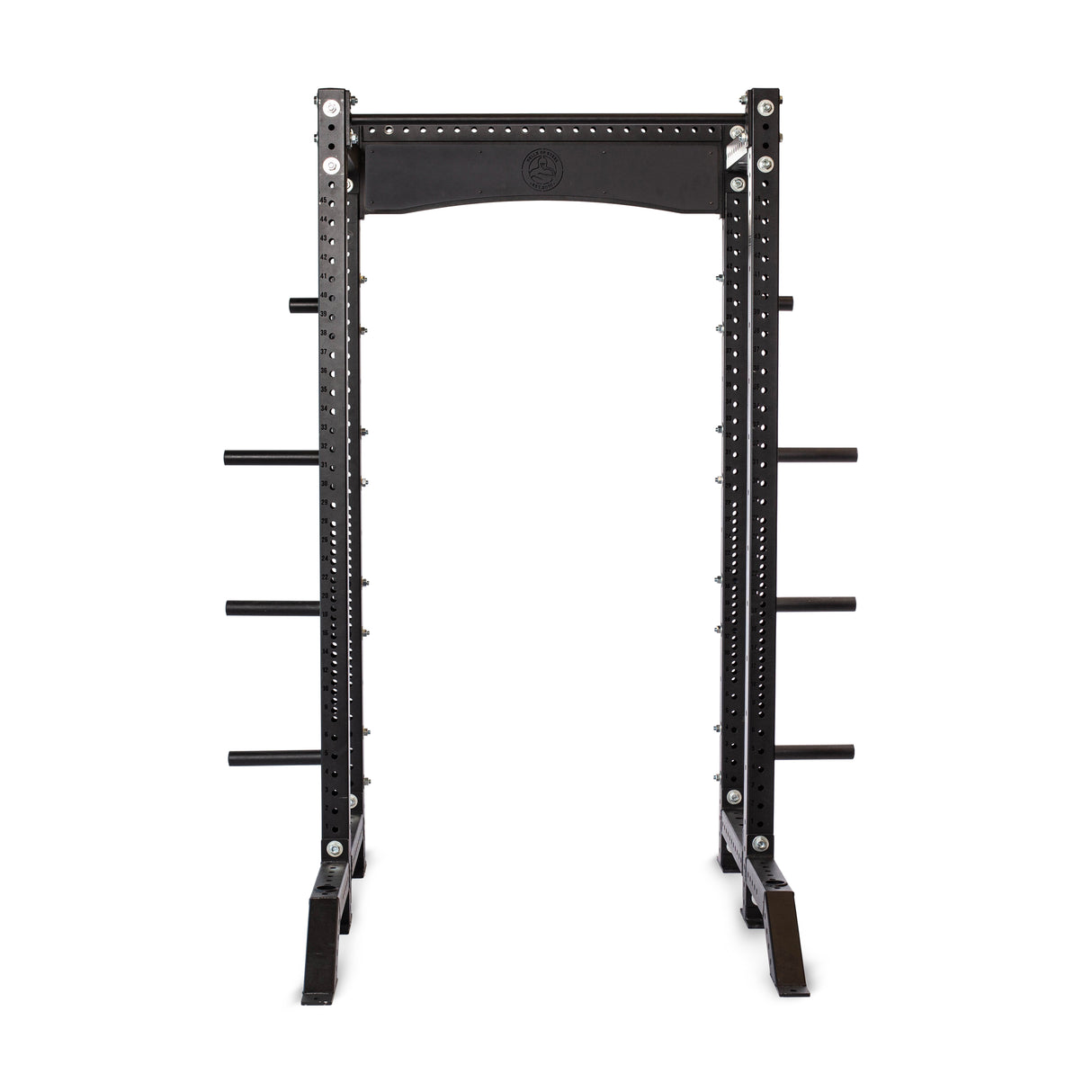 The Hydra Collegiate Power Rack Builder by Bells of Steel features a black sturdy frame with ⅝" holes for adjustability, side posts for weight storage, modular components, and a pull-up bar. It's designed for weightlifting exercises and set against a plain white background.