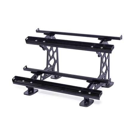 A utilitarian, black weight rack with a geometric frame design for interchangeable components, offering three flat bars for ample storage. The sleek and functional construction by Bells of Steel ensures stylish organization.