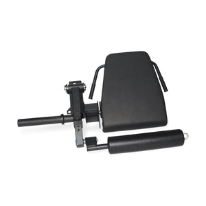 The Bells of Steel Leg Curl/Leg Extension Rack Attachment in black features padded rollers and a backrest for leg support and comfort. It includes metal brackets for easy attachment to a gym bench or workout station, perfect as an adjustable workout bench accessory.