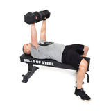 Male athlete doing  bench press using Ergo Rubber Hex Dumbbells (full body)