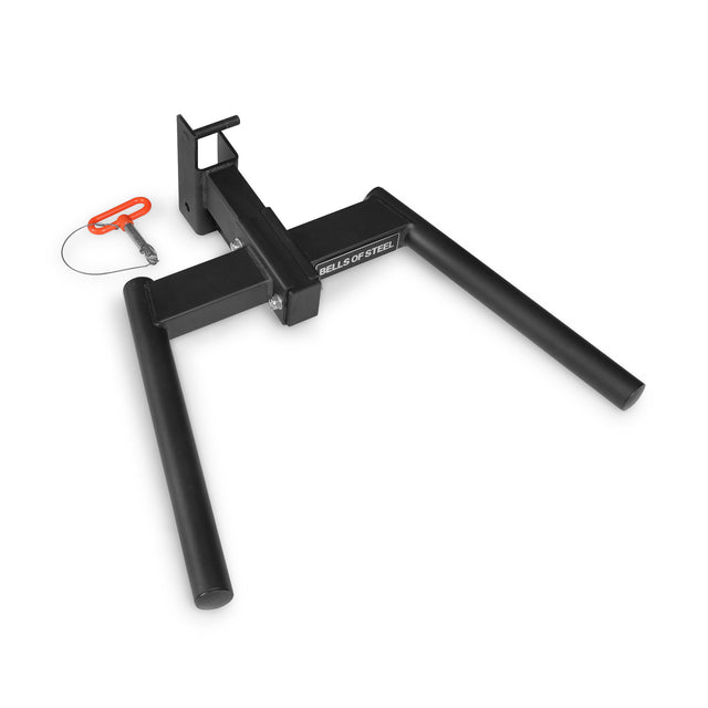 Bells of Steel Y Dip Bar Rack Attachment, a black steel power rack dip station accessory with a separate orange-handled locking pin.