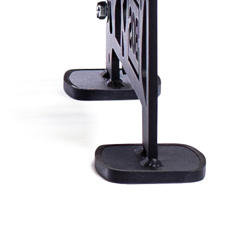 Close-up side view of two black metal legs with rectangular flat bases, part of the Bells of Steel Commercial Interchangeable Weight Rack - Components Only, supporting a swappable storage shelf against a white background.