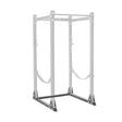 A Bells of Steel Hydra Flat Foot Support System power rack in silver metal is displayed on a white background, featuring adjustable safety bars, multiple bolt holes for customization, and reinforced triangular bases for enhanced stability.