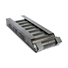 The Bells of Steel Foam Roller Storage is a black metal rack with "BELLS OF STEEL" cut out on the side, ideal for organizing foam rollers and bars to keep your gym space streamlined and tidy.