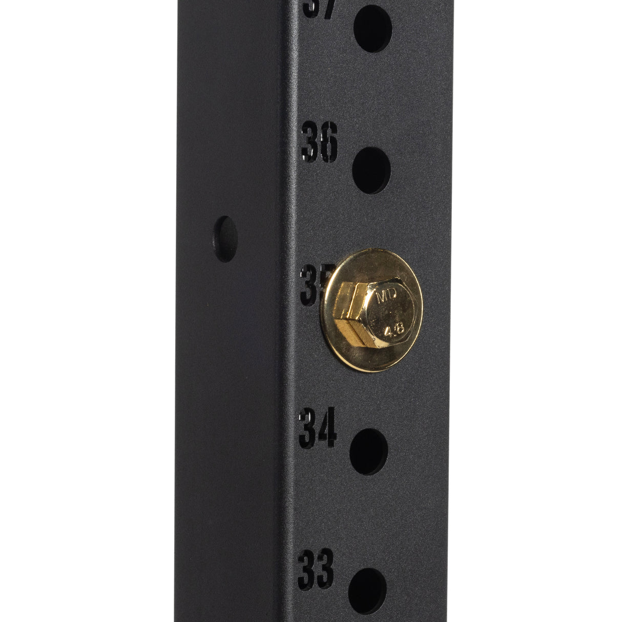 Close-up of a black metal post with holes numbered 33 to 37 featuring a Bells of Steel Gold / Black Titanized Bolt for Hydra inserted in hole 35.