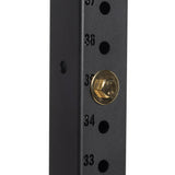 Close-up of a black metal post with holes numbered 33 to 37 featuring a Bells of Steel Gold / Black Titanized Bolt for Hydra inserted in hole 35.