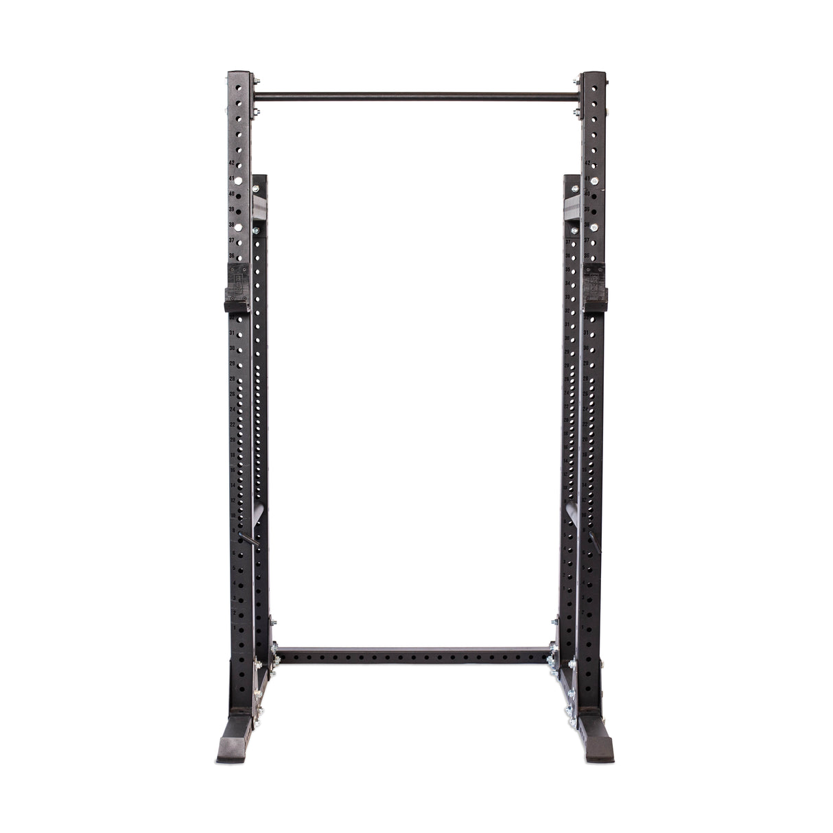 The Bells of Steel Hydra Half Rack Builder (3" x 3", ⅝" Holes) is a black metal weightlifting rack with adjustable safety bars and multiple height settings. Set against a white background, its robust construction makes it perfect for any home gym.