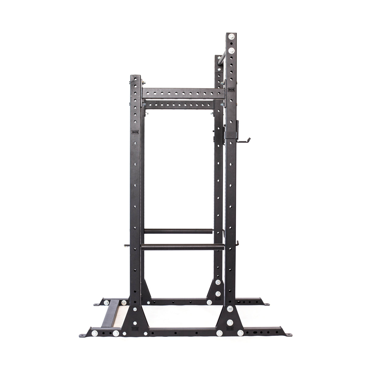 The Bells of Steel Hydra Half Rack Builder, made from black metal with adjustable height and ⅝" holes for attachments, stands on a sturdy base and supports up to 1,000 pounds. It is ideal for weightlifting exercises like squats and bench presses.