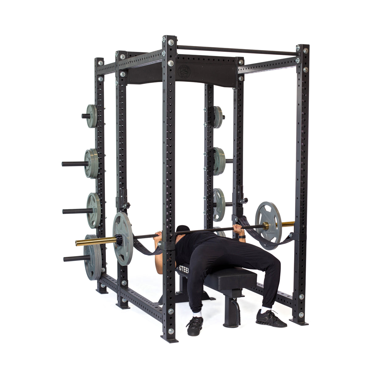 Male athlete doing bench press with Hydra Six Post Power Rack PREBUILT