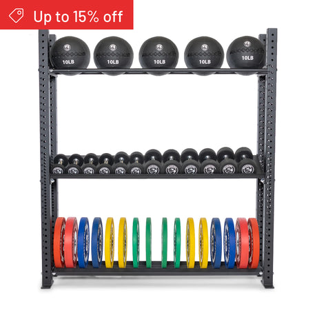 The Bells of Steel Hydra Storage Builder is a modular metal gym rack that holds medicine balls, dumbbells, and colorful weight plates. A red banner in the corner shows "Up to 15% off." Ideal for customizable home gym storage solutions.