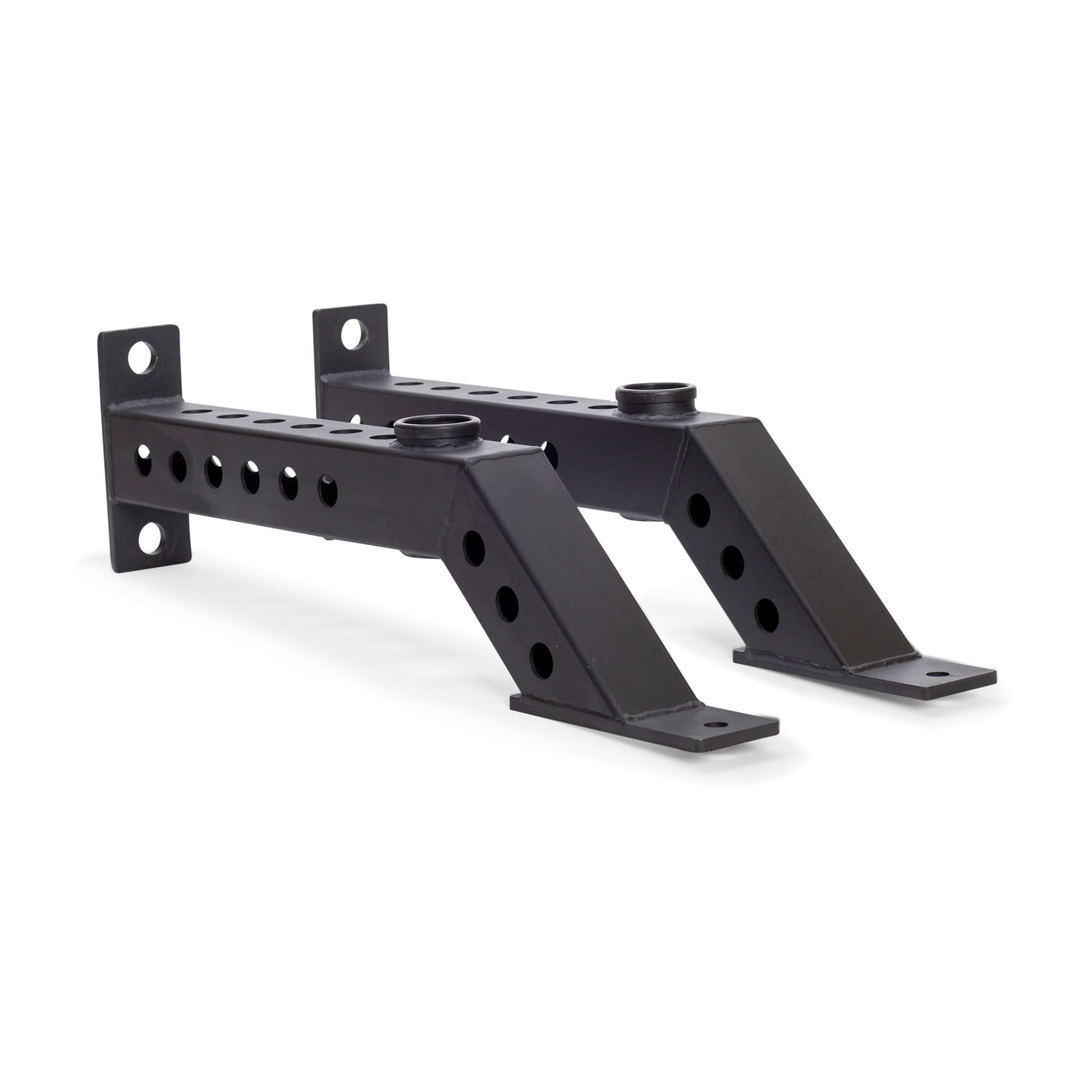 The Bells of Steel Front Foot Stabilizers are two black metal brackets with multiple holes, angled sections, and flat mounting plates at both ends, designed to add support or enable barbell storage on your power rack.