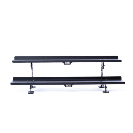 The Bells of Steel Commercial Interchangeable Weight Rack - Components Only features two black metal horizontal bars with central "SOS" logos on adjustable legs, ideal for competition kettlebell storage or as a swappable shelf.