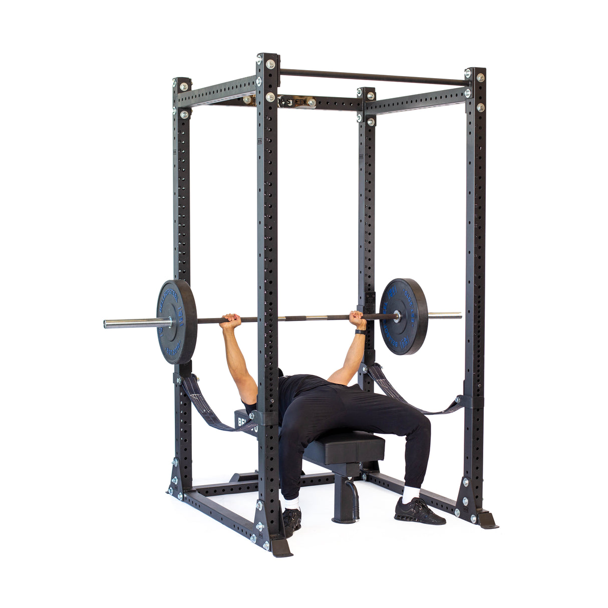 Male athlete doing bench press with Hydra Flat Foot Power Rack PREBUILT 