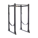 Image of the Bells of Steel "Hydra Flat Foot Power Rack Builder" in black, ideal for strength training. It features modular 3" x 3" components with ⅝" holes for adjustable Hydra attachments, a pull-up bar on top, and stabilizing safety straps on both sides.