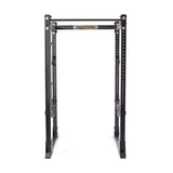 The Bells of Steel Hydra Flat Foot Power Rack Builder features a sleek black metal rectangular frame with 3"x3" and ⅝" holes for workout gear. Perfect for weightlifting and strength training, it's enhanced with Hydra attachments, modular components, and stands out against a white backdrop.