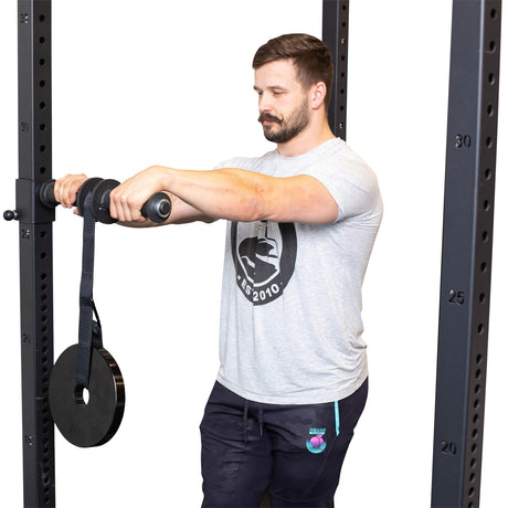 male athlete using the Wrist Roller and Rack Attachments
