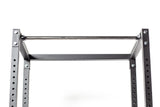 A close-up of the Bells of Steel Residential Power Rack (2.3" x 2.3", ⅝" holes) shows its black metal frame, pull-up bar, adjustable J-cups, and bolt holes—ideal for any home gym against a white background.