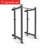 The Bells of Steel Manticore Folding Power Rack Builder (3" x 3", 1" Holes) in black metal is displayed on a white background, ideal for home gyms. A red banner at the top left states "Up to 15% off.