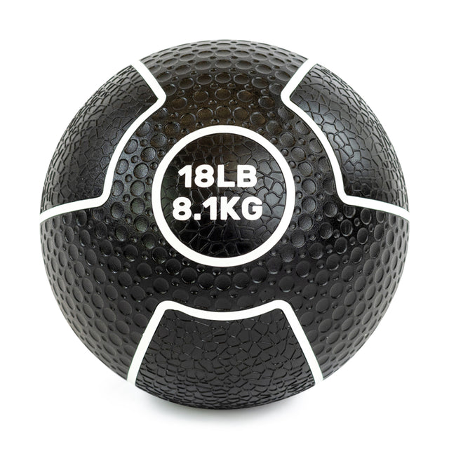 The Mighty Grip Medicine Ball by Bells of Steel, featuring a black textured surface with white accents, provides an excellent grip for all fitness levels. It has "18LB 8.1KG" printed in white at the center, ensuring reliable performance.