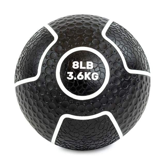 The Bells of Steel Mighty Grip Medicine Ball, suitable for all fitness levels, features a black textured surface with "8LB" and "3.6KG" in white at the center. Its superior grip is enhanced by a panel design outlined with distinct white lines.