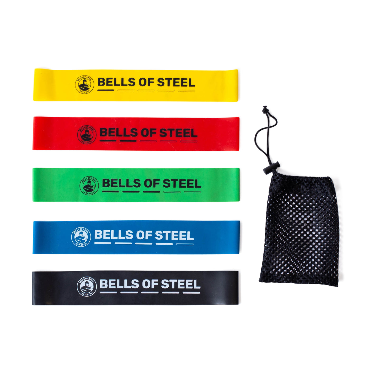 Five Bells of Steel Mini Bands in yellow, red, green, blue, and black—each labeled with the brand name—are neatly lined up beside a black mesh drawstring bag. Add these versatile resistance bands to your gym accessories collection.