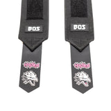 Two black Mighty Wrist Wraps by Bells of Steel with "BOS" labels and end tabs featuring a white and pink "HYDRA" logo above a dragon skull. These powerlifting essentials provide wrist support and stand out on a white background.