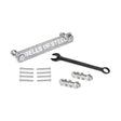 Manticore Hardware by Bells of Steel—including a metal bar, black wrench, bolts, nuts, screws, and concrete anchor bolts—is neatly arranged on a white surface, ready for power rack assembly.
