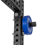 Blue weight plates on a rack using Bolt-On Plate Pegs