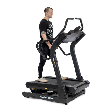 	male model walking on the blitz mountain climber treadmill