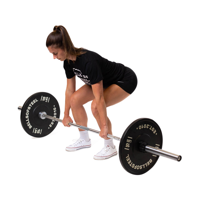 Female Athlete demonstrating deadlifts using the Standard Hard Chrome Olympic Lifting Needle Bearing Bar