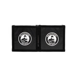 The Bells of Steel Deadlift Platform Drop Pad Pair features two black square pads with a white logo, flexed arm, and "EST. 2010" on each pad. Placed side by side, they reduce noise and absorb impact.