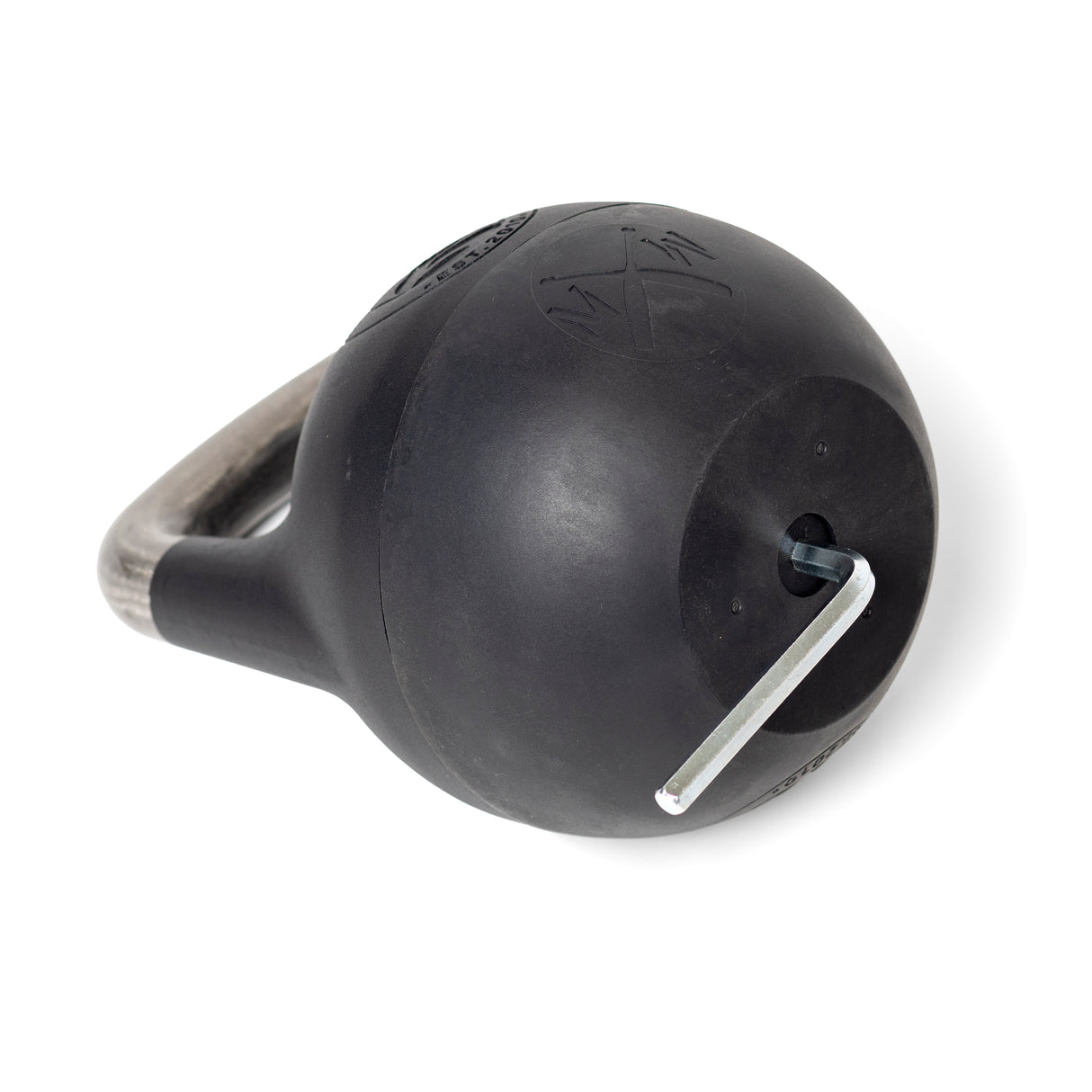 	close up picture of the Adjustable Kettlebell with a plastic bottom being removed by an allen wrench