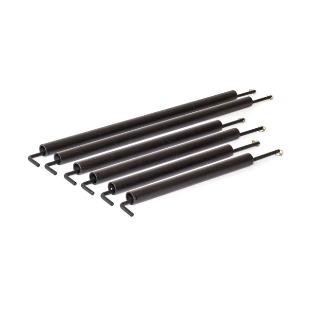 Six black Bells of Steel Pin Pipe Safeties, cylindrical with hooks at one end and rounded attachments at the other, are arranged in a fan-like pattern on a white background for reliable training safety.