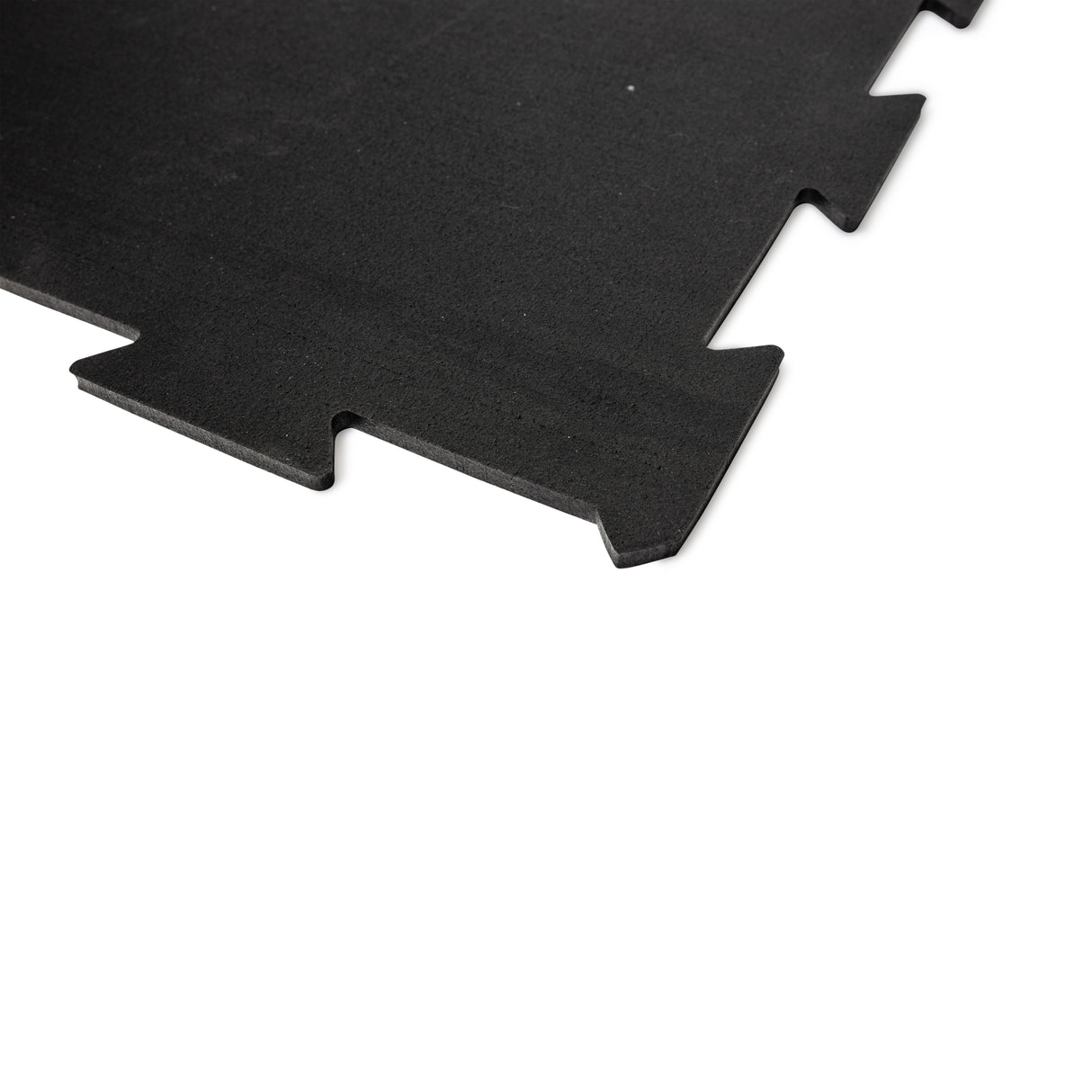 Close-up of black puzzle mat with textured surface for floor protection.