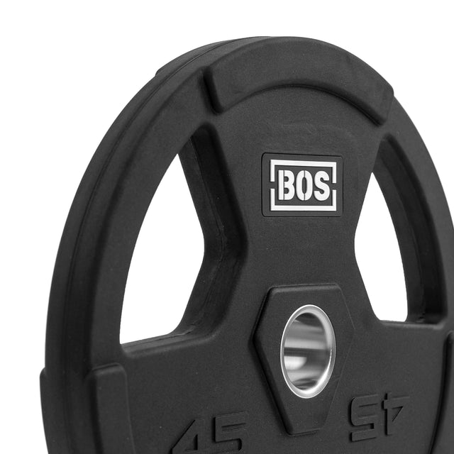 A close-up of a Bells of Steel rubber-coated iron weight plate highlights ergonomic handles around a central hole with the white "BOS" logo. The plate, marked "45 Kg" near the bottom edge, offers three side grips for easy handling.