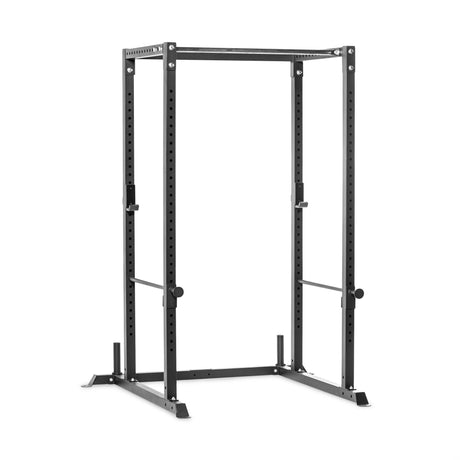 The Bells of Steel Residential Power Rack (2.3" x 2.3", ⅝" holes) features adjustable supports, j-cups, and safety bars for squats and bench presses—its sturdy black metal frame is perfect for any home gym setup.