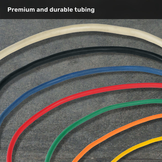 Six colored Human Trainer - Ripcords by Bells of Steel USA (white, black, blue, green, orange, and yellow) are arranged in parallel curves on a gray surface. At the top, the text reads “Premium and durable tubing.” This versatile set can be paired with rubber handles or a door anchor for resistance band workouts.