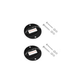 Two black circular metal wall mounts—the Human Trainer - Ceiling Mounts by Bells of Steel USA—are displayed, each crafted as a dependable fixed anchor for your resistance band system or as a secure ceiling mount. Each mount is accompanied by four screws, washers, and wall plugs, all neatly arranged on a white background.