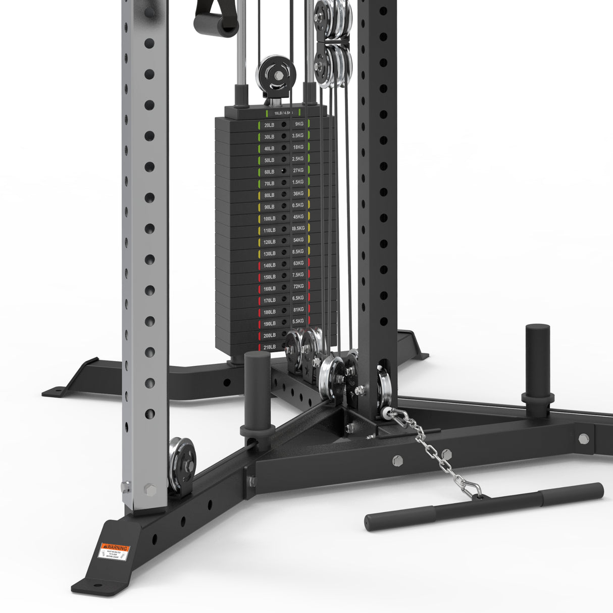 A close-up of the Bells of Steel All-in-One Trainer showcases weight stacks, pulleys, a chain attachment, and handles. This versatile cable machine is perfect for weightlifting exercises in any fitness setting.