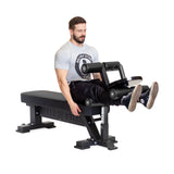 male athlete doing leg extensions using the Hero Heavy-Duty Weight Bench with Leg Extension/Leg Curl and Adapter